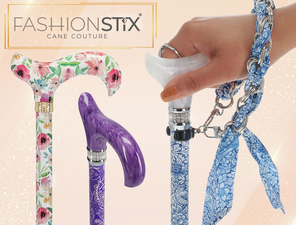 Decorative walking canes with floral and purple designs, held by a hand with a blue ribbon, on a beige background.