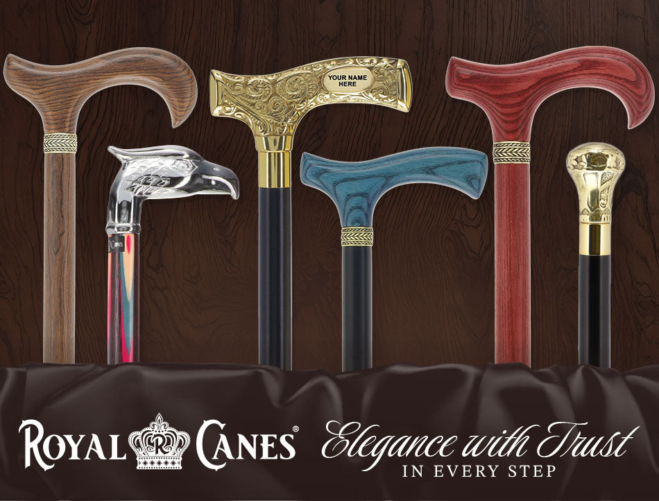 Collection of walking canes with decorative handles on a wooden background, featuring the Royal Canes brand.