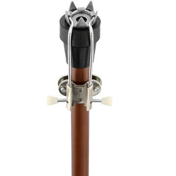 Cane ice grip attachment clamped on a walking cane